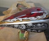 Custom painted chopper tank candy apple red airbrushed skulls triba